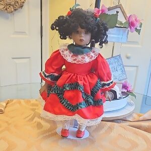 Elegant Red and Green Doll with Lace Accents